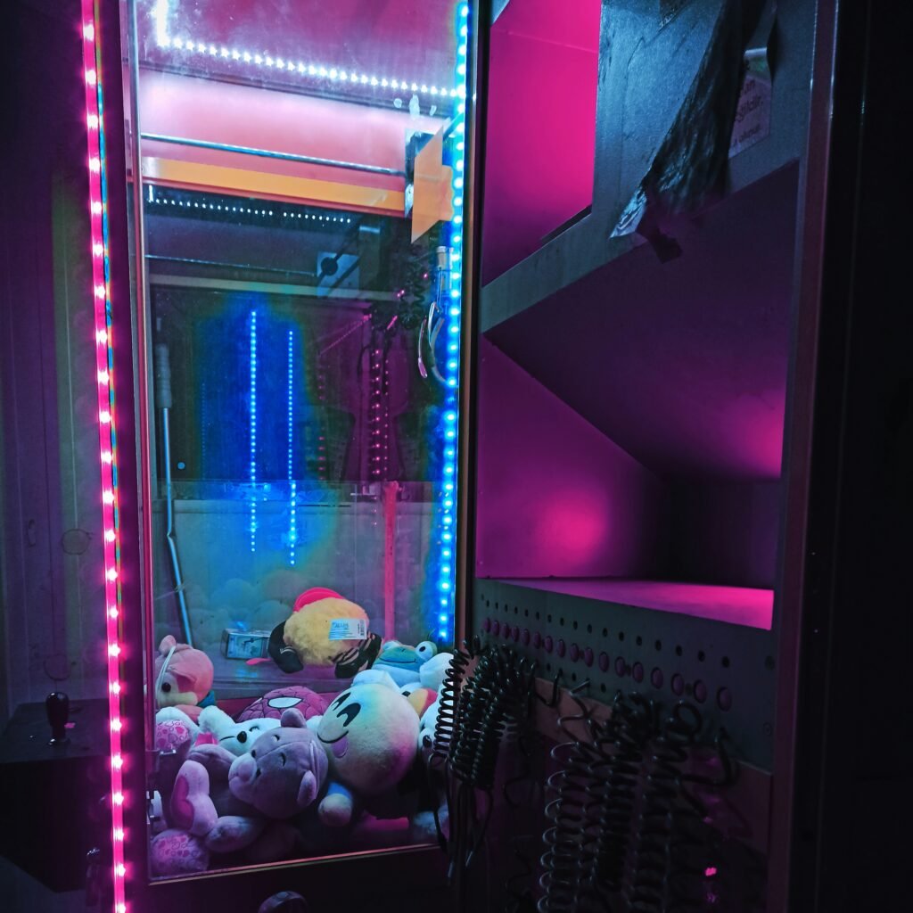 a room with a mirror and a bunch of stuffed animals